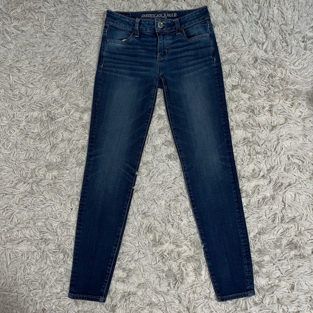 Low rise skinny blue jeans size 0 from American Eagle.